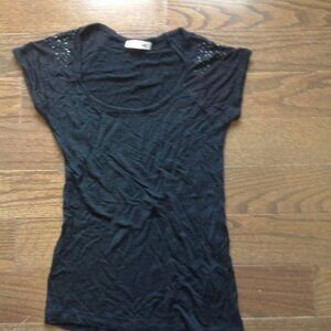 Black top with shoulder detail